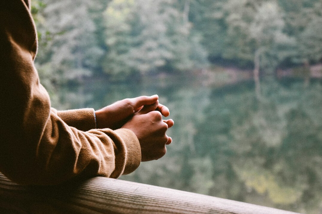 person reflecting on personal development journey