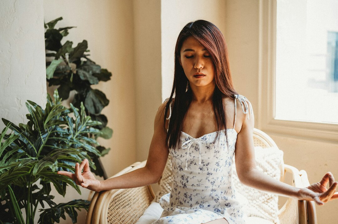 woman practicing breathing exercises
