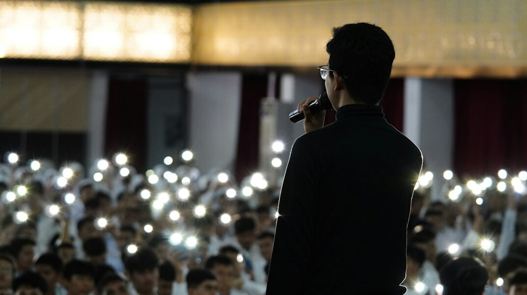 person speaking on stage